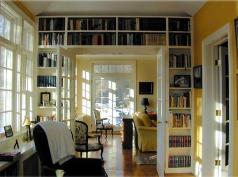a view of the living area from the study