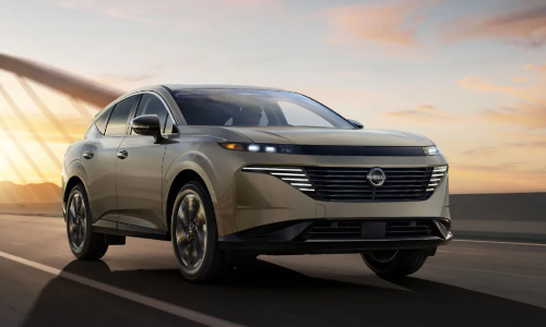 Nissan SUV side image Nissan SUV driving over a bridge