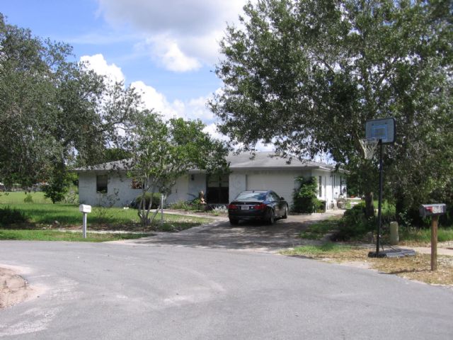 (SOLD) 4/2  on lake in SpringHill, FL $67,500