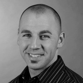 Dan_black_head_shot_6x9
