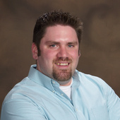 Head_shot_with_arms_crossed