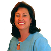 Colleen_at_table_blue_sweater_cutout_300dpi_shoulders_up
