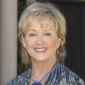 Anita_headshot_with_blue_necklace-01