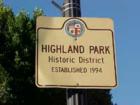 Highland park street sign. Highland park photo submitted by Mission Grove Realty, Realtors. California real estate. Homes, land and investment property in CA.