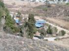 A home tucked in the hills below Spraig Heights, hemet CA