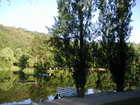 L. Crystal Falls Pond in summer time.