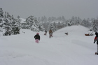 It takes a village and a few heros to dig out Muirfield Lane in Hiwan of Evergreen.