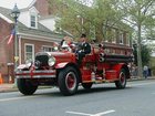 Antique fire truck participating in the parade during "Old Dover Days"