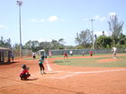 Kids playing baseball.