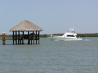 Yacht pulling into Marco Island Yacht Club.