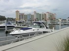 Photo of boat slips and back of the condominum complex. Custom homesites also available