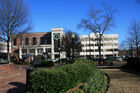 The Cobb County Superior court is the brick building on the left with the clock and to the right is the municiple building. County land records are stored in the white marble building on the right. View from beautiful Glover Park Square downtown.