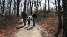 A family enjoys a warm, mid-winter day on Kennesaw Mountain a National Battelfield Park and significant site of rebel defense in the Battle of Atlanta on Sherman's March To The Sea. Sherman spared downtown because it reminded him of home.