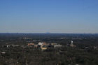 In the foreground rising from the forest is the state of the art Kennestone Hospital. Truly one of the most reknowned hospitals in the southeast. To the left Perimiter Center, to the right Cumberland/Galleria and on the horizon Stone Mountain.