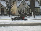 This Bronze Bunny, all dressed up for the Holiday's, marks the gateway to the Longfellow community on Minnehaha Parkway.