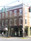 This building is in the center of Rhinebeck, here you can find the cigar store and liquor store.