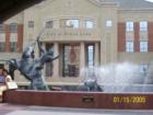 A monument of Stephen F. Austing in front of Sugar Land City Hall