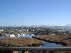 A view of Ebey Slough, the Marysville Marina and the Cascade Mountains from Interstate 5.