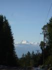 Coming over the ridge on Anderson Hill Road. Your first view of the Olympics.