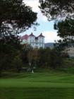 A view of the Mount Washington Hotel from below at the first green. A downhill par 3 opening hole.