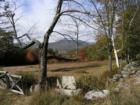 A view looking north at Lake Chocura and the hills behind it.