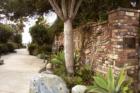 Brown's Park, a charming hole-in-the-wall park, offers benches to rest weary feet and stunning beach front views.