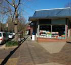 Corner Store. The Montford Community. Brick sidewalk. Neighborhood feeling. Photo courtesy of J.T. Narrin, Photographer for the Firm