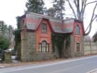 A gatehouse on River Road
