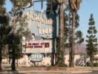 Sign drawing in guests to the Historic San Gergonio Inn, On Ramsey, in downtown Banning CA