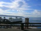 "Drive-By Photo" of the Seattle Ferry Terminal from the Alaskan Way Viaduct, West Seattle's Alki Point is off in the distance.