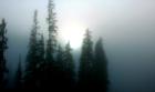 Lower Sun Peaks Village, finding the sun over Mt. Morrissey through dense village fog.  Photo by Richard Anderson.