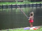 Fishing in Severna Park, Virginia at an inlet of the Severn River.  Copyright 2000 Lenn Harley