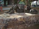 This is a great statue in front of the Gilbert library.