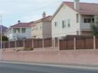 From the front, homes in Vista Ridge (in Boulder City, Nevada) appear to be one story. This photo from Utah St. shows that they are 2-story homes.