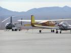 Small planes and a helicopter await their next flights at the Boulder City Airport in Boulder City, Nevada.