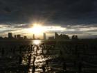 NY, NY: View to New Jersey from the West Side Highway Piers, during sunset