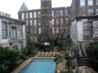 Cotton Mills Condos in the New Orleans Warehouse District feature a large courtyard and nice pool. City living with a courtyard adds the New Orleans Flavor to Warehouse Conversions