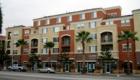 Newer apartments built in downtown Fullerton. Ground level shops. Photo by Lynda Eisenmann
