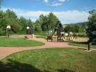 This park, with its many shaded areas, features a modern playground, two tennis courts, a basketball court, an in-line hockey rink, & a large flat area used by local soccer assns.  For a full video go to www.julieeichacker.com