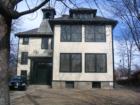 Once the old school house , then converted to apartments and is presently under renovation.
