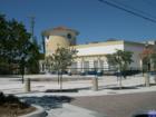 Florence De George Boys and Girls Club in Riviera Beach, with water fountain in playground area.