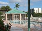 Palm Harbor Club, its pool overlooking the harbor and canal, Fort Myers Beach, FL