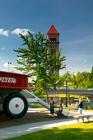 The Clock Tower and giant Radio Flyer Wagon play area in Riferfront park wich is located in downtown Spokane Washington.