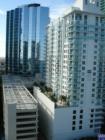 Condos, pool deck and parking.
