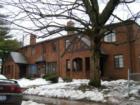 One of the many small multi family buildings in the area.  This one is uncommon as it is all brick and 4 units