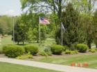 Flag poles at Sleepy Hollow Country Club.