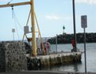 Makaha - fishing by the no fishing sign