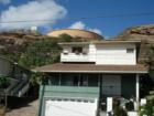 Makaha - large water tank above the homes