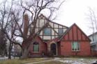 Pop top home ~ the neighborhood was much too nice to leave, so they expanded upward.