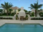 Vero Beach, FL 32963  -  Courtyard fireplace and seating area with private pool.
      www.VeroPremierPropeerties.com